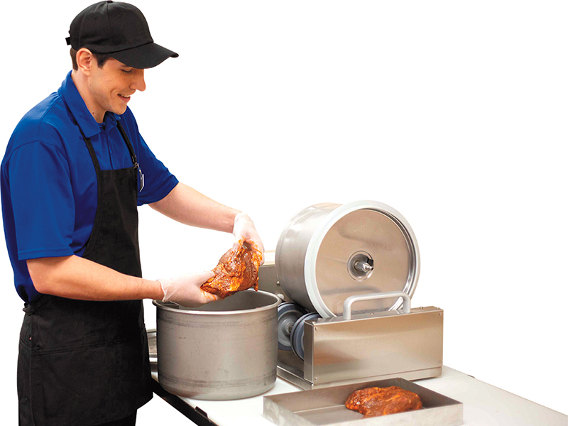 Stater Bros. Markets Certified Meat Cutter Vaccum Marinating The Meat For a Customer