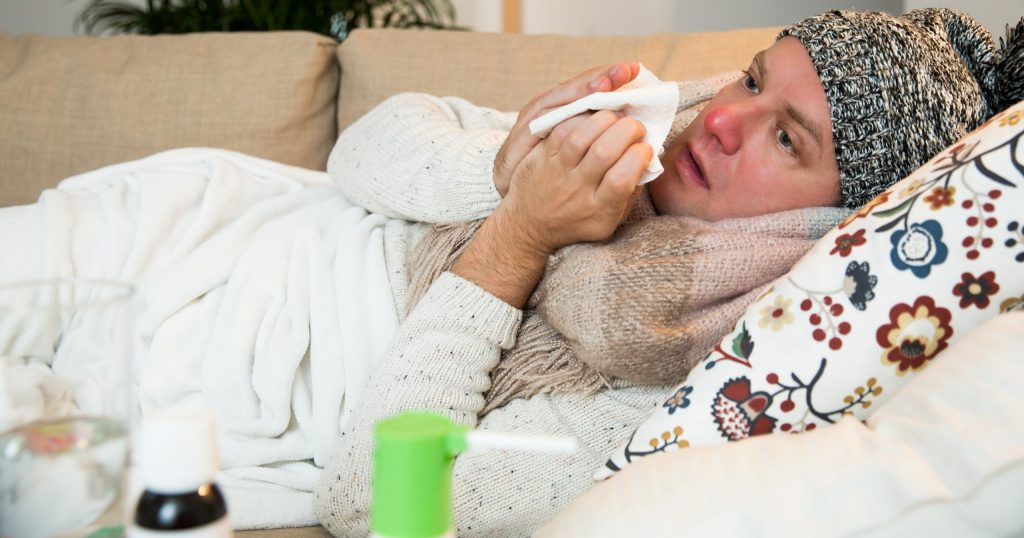 Sick man in bed