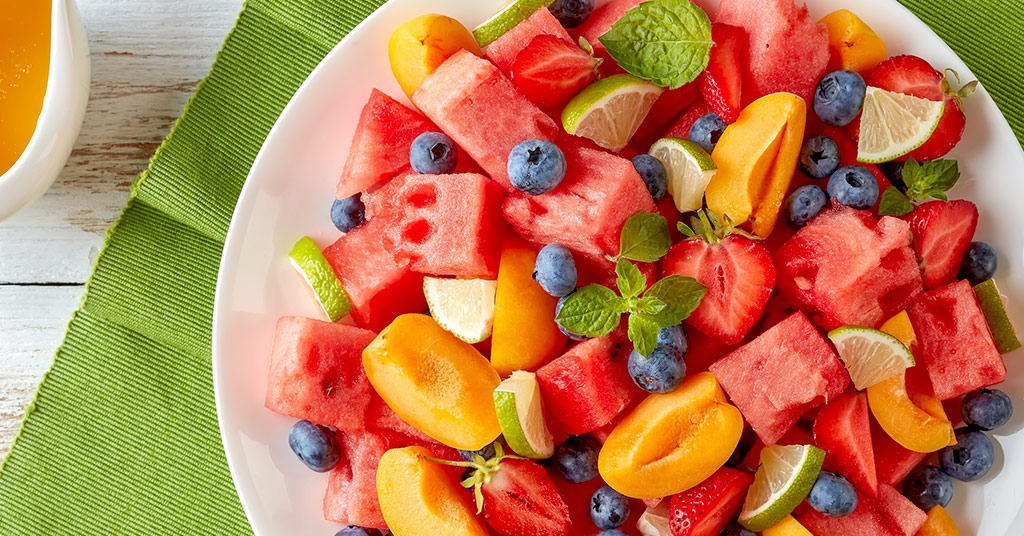 Plate of summer fruit.