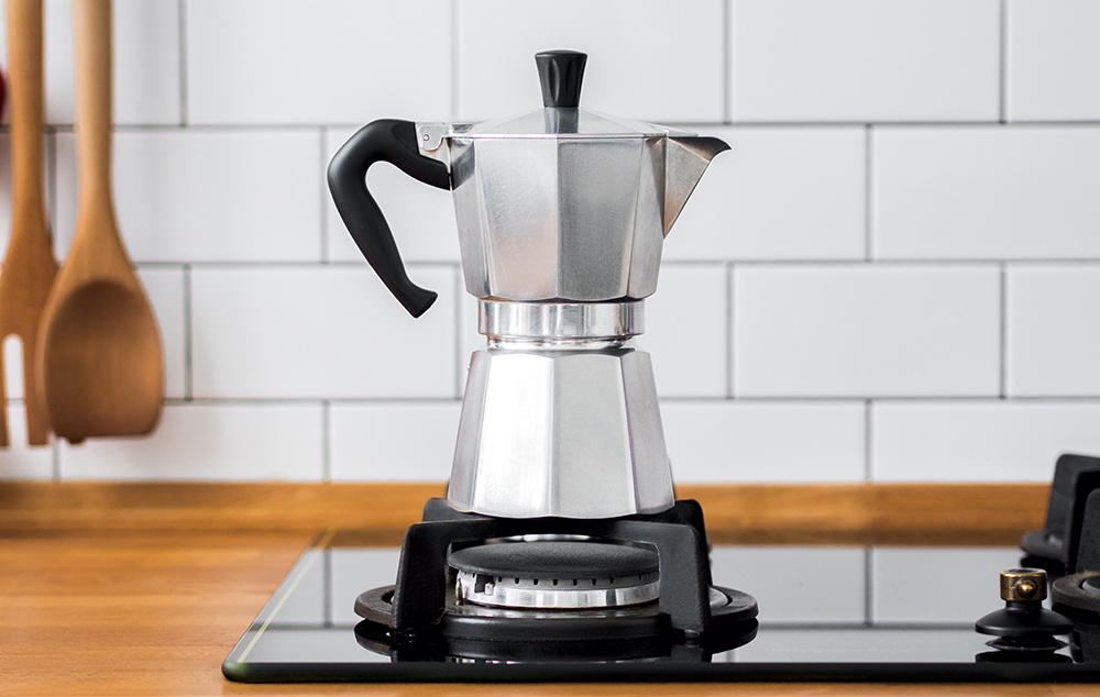 Moka coffee pot on a gas stove.