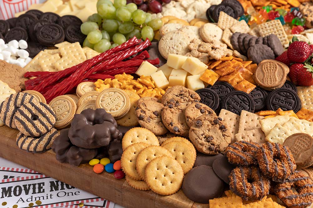 Movie Night Board with cookies, crackers, candy, and fruit.