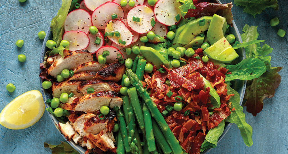 Hearty salad prepared with leftover turkey and sides.