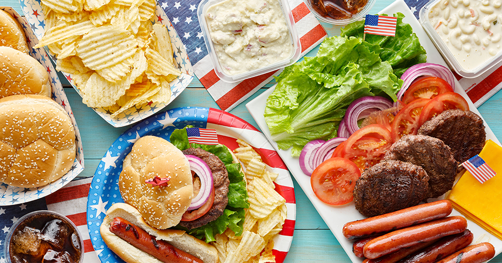 4th of July Summer BBQ Food Featuring Hamburgers, Hotdogs, and Chips and Dip