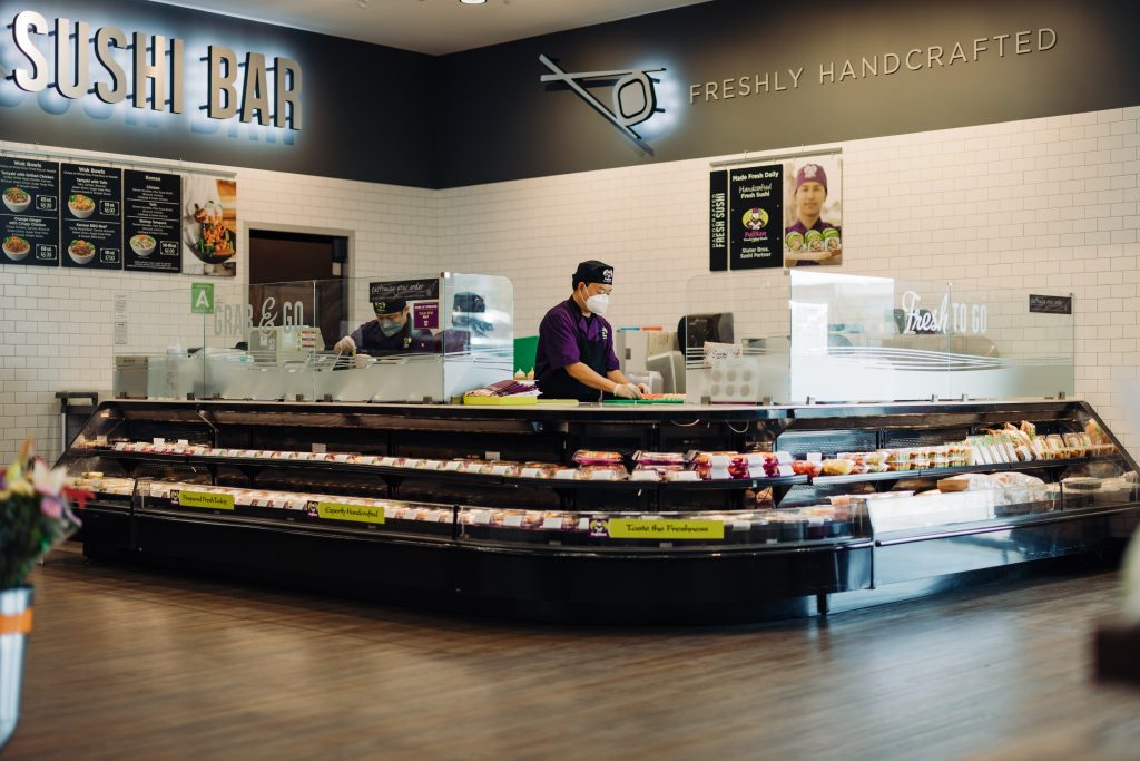 Stater Bros. Markets In-House Sushi Chef Preparing a roll at the Sushi Bar