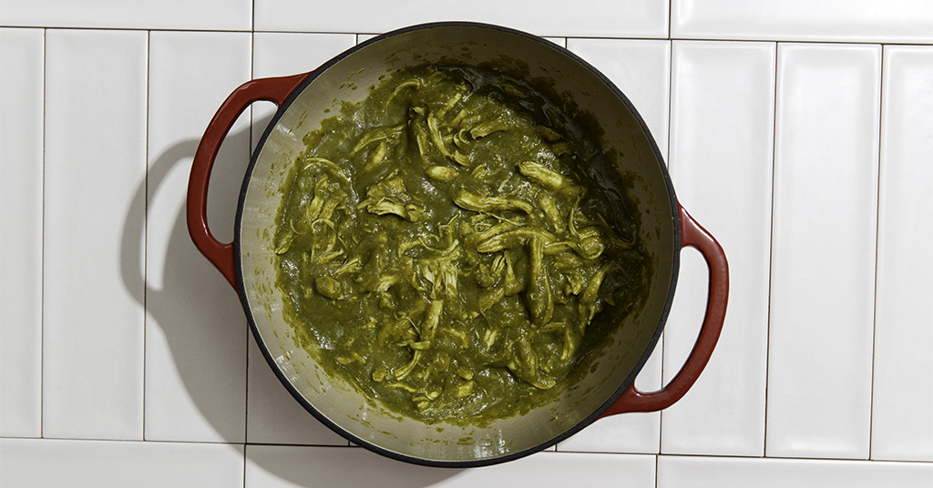 Spicy green chicken chile verde filling for tamales made with a belnd of tomatillos, jalapenos, serranos, and pasilla peppers.