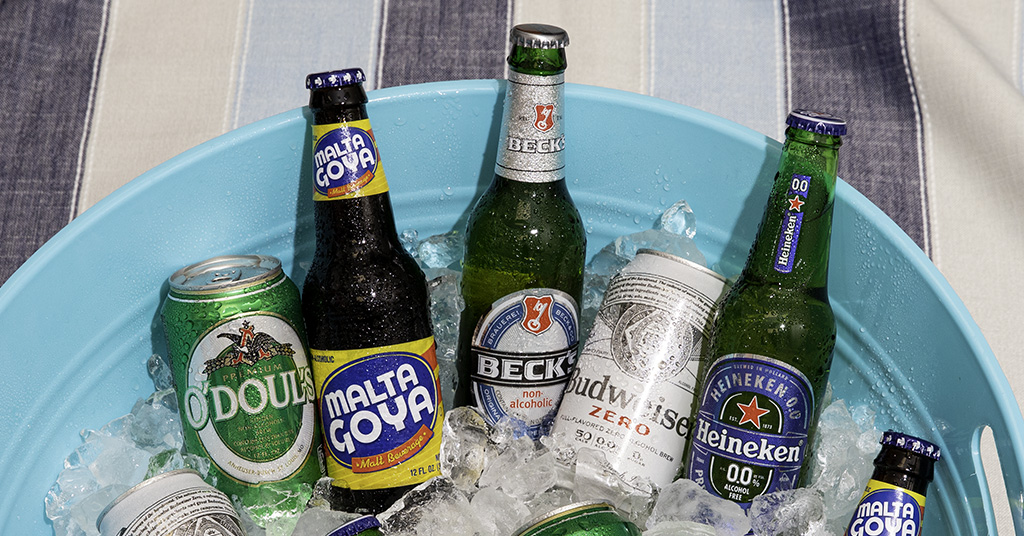 A selection of alcohol free beers including O'Doul's, Beck's, Budweiser Zero, Heineken, and Malta Goya.