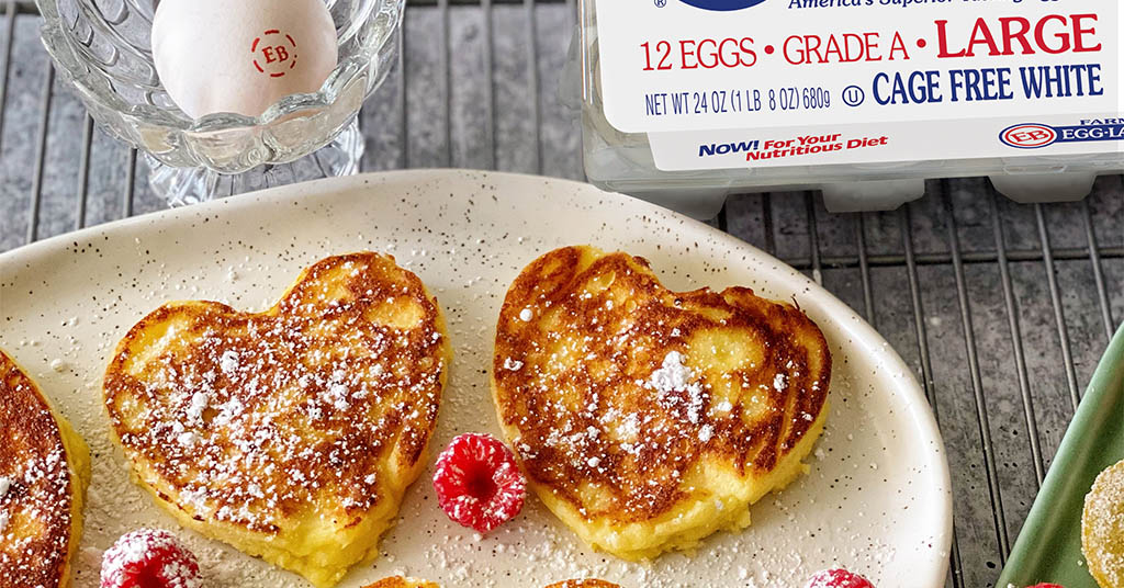 Heart shaped lemon ricotta pancakes made with egglands best eggs for galentine's day.