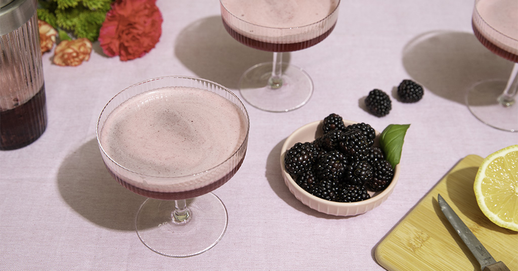 Spring seasonal cocktail made with gin, blackberries, and lemons.