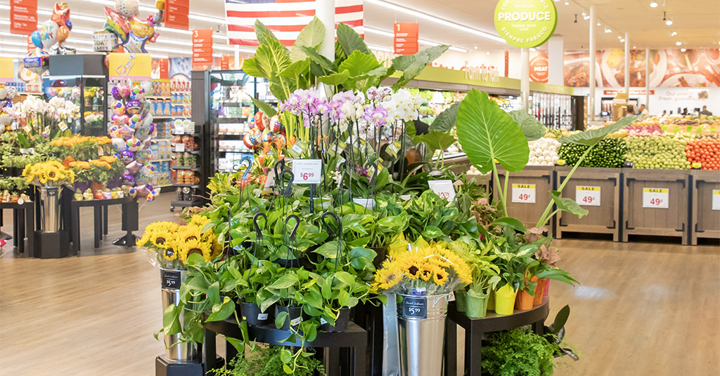 Plant and floral display at a grocery store.