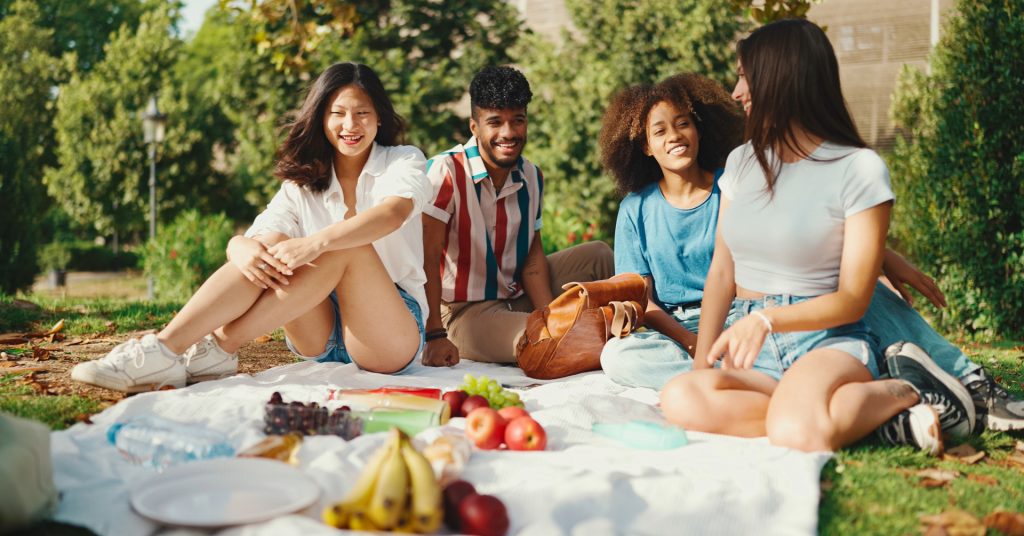 friends enjoying a spring picnic