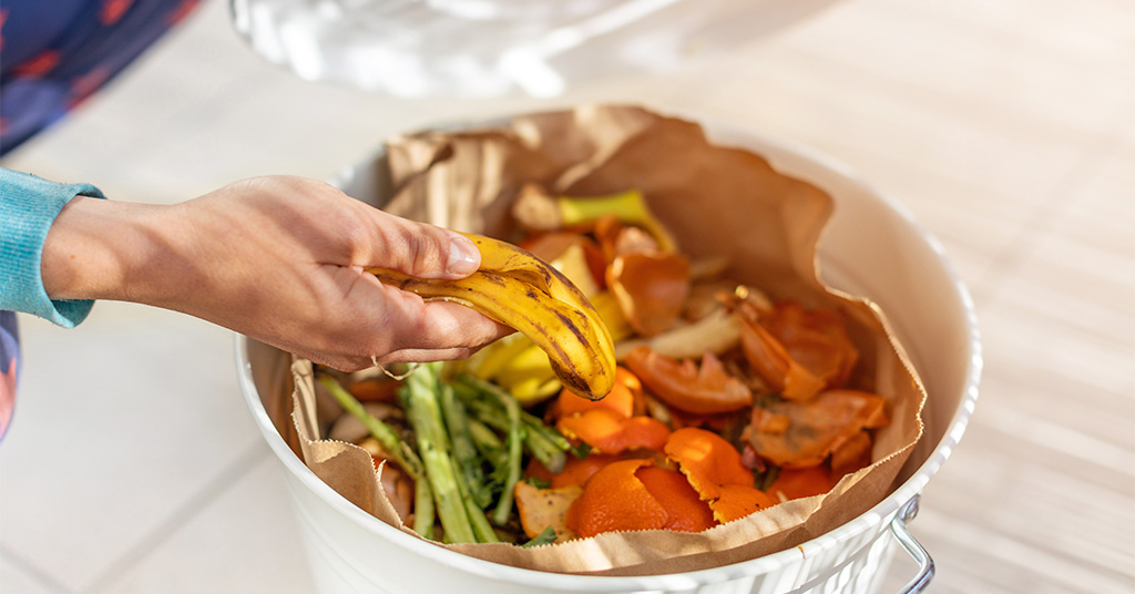 Container full of domestic food waste ready to be composted