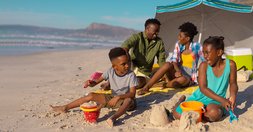 Family enjoying time together on their beach trip.