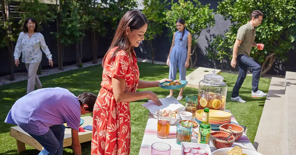 Family Enjoying a Backyard Cookout for Labor Day Weekend
