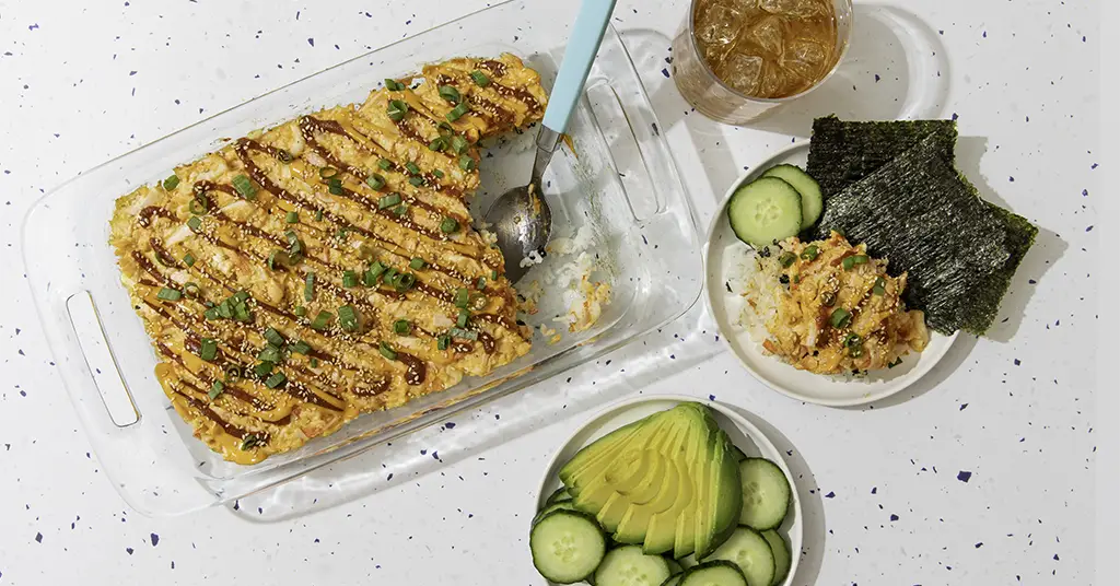 Sushi Bake Served with Avocado, Seaweed and Cucumber