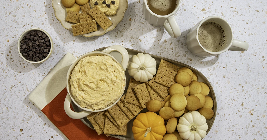 Pumpkin fluff plated with graham crackers and vanilla wafer cookies.